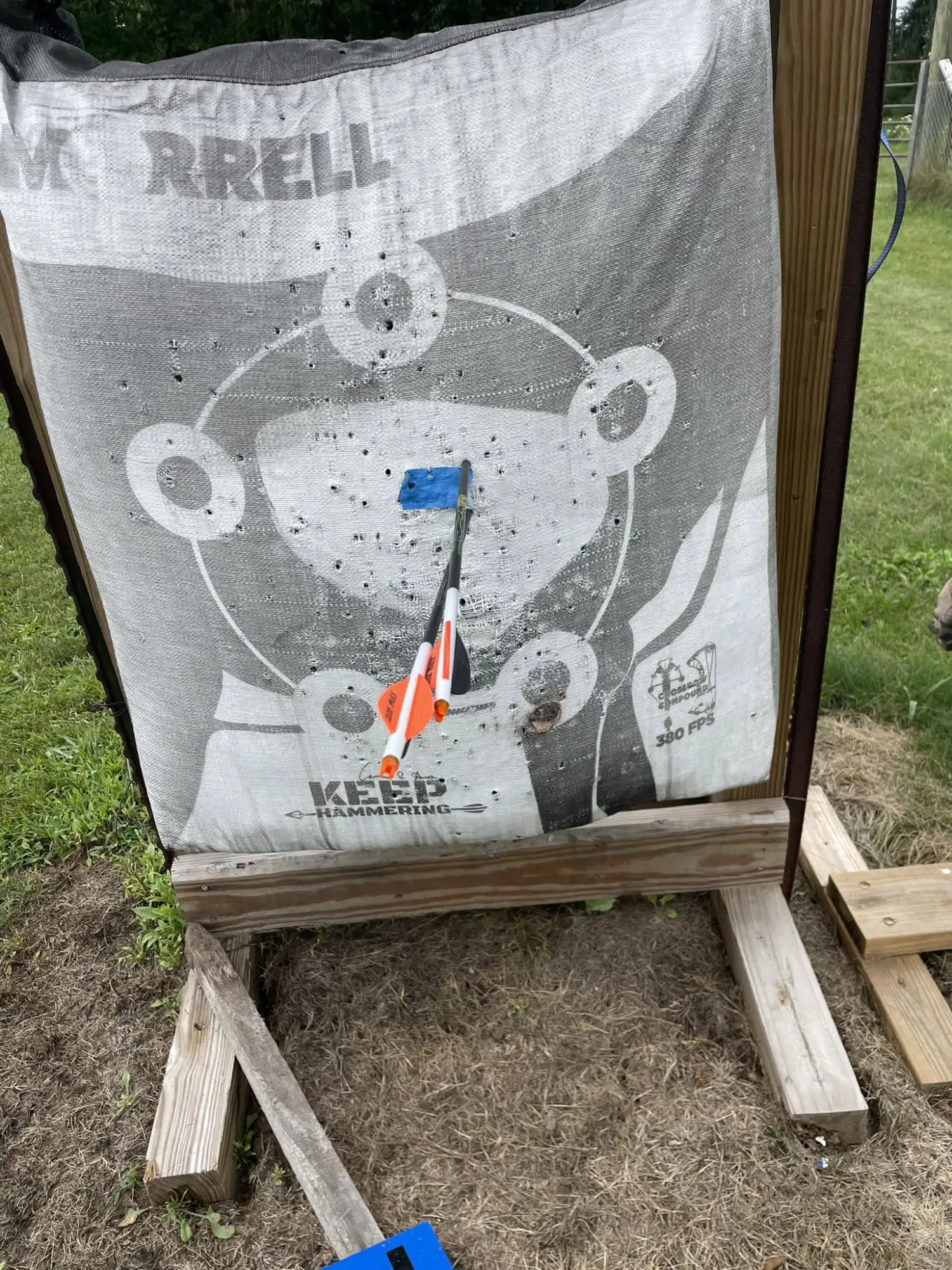 Archery target with arrows