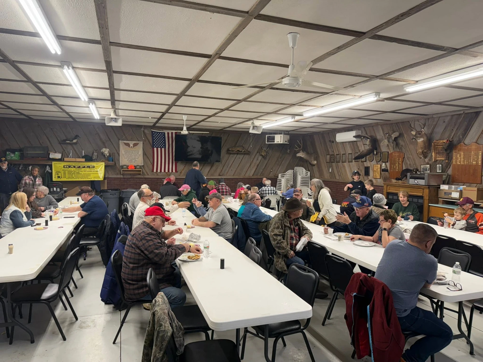 Members eating at a clubhouse dinner event