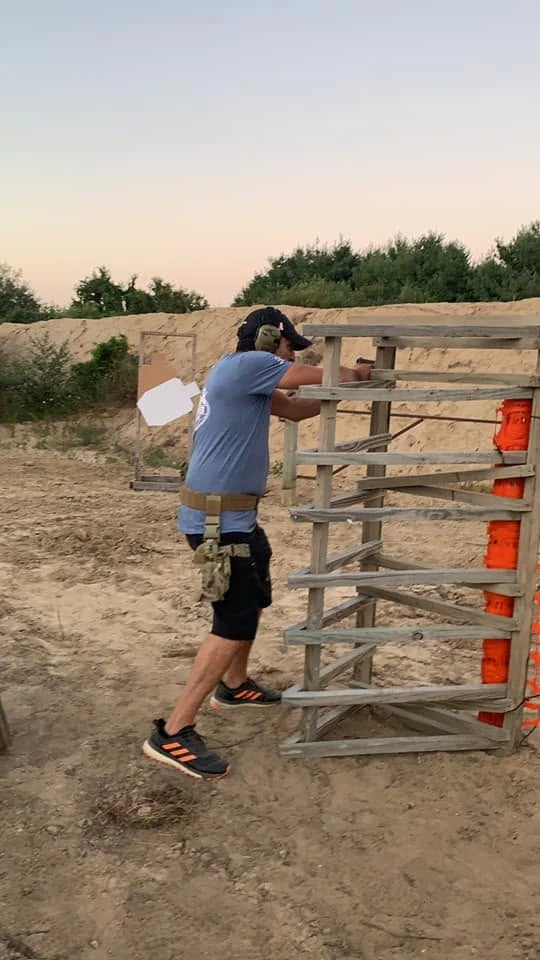 Member on the pistol course at dusk